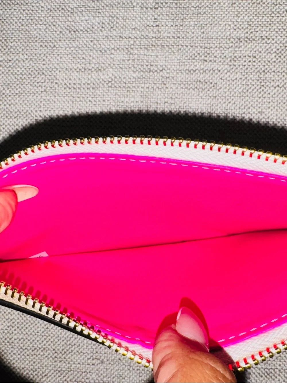 kate spade Black and White Striped Patent Zip Pouch